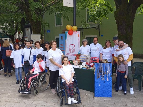 Charity stand with handmade crafts on the town square