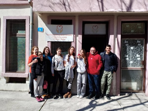 Young people in front of the association’s premises